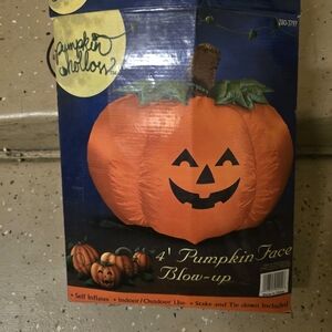 Orange Pumpkin Inflatable with Green Leaves